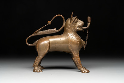 A bronze lion-form aquamanile and two rooster-form aquamanilia, one chromed, Germany, 19th C.