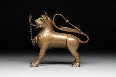 A bronze lion-form aquamanile and two rooster-form aquamanilia, one chromed, Germany, 19th C.