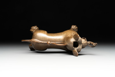 A bronze lion-form aquamanile and two rooster-form aquamanilia, one chromed, Germany, 19th C.
