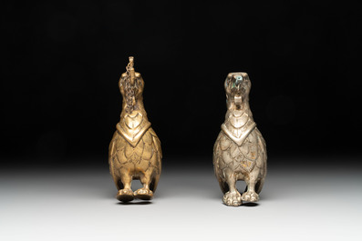A bronze lion-form aquamanile and two rooster-form aquamanilia, one chromed, Germany, 19th C.