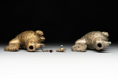 A bronze lion-form aquamanile and two rooster-form aquamanilia, one chromed, Germany, 19th C.