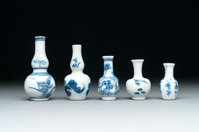 Ten Chinese blue and white miniature vases with figural and floral design, Kangxi