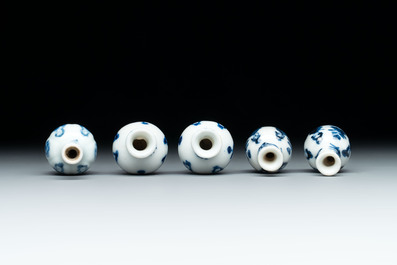 Ten Chinese blue and white miniature vases with figural and floral design, Kangxi