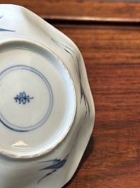 A set of six Chinese blue and white flower-shaped 'sanduo' cups and saucers, lingzhi mark, Kangxi