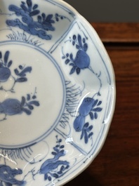 A set of six Chinese blue and white flower-shaped 'sanduo' cups and saucers, lingzhi mark, Kangxi