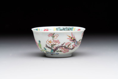 A set of six Chinese famille rose 'birds among flowering branches' cups and saucers, Yongzheng/Qianlong