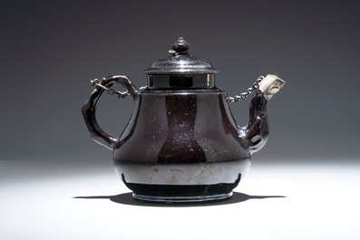 A black-glazed pottery coffeepot, teapot, milk jug and a bowl, Namur, 18th C.