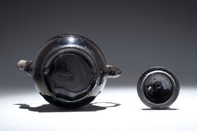 A black-glazed pottery coffeepot, teapot, milk jug and a bowl, Namur, 18th C.