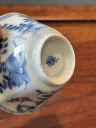 A set of six Chinese blue and white flower-shaped 'sanduo' cups and saucers, lingzhi mark, Kangxi