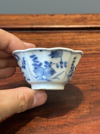 A set of six Chinese blue and white flower-shaped 'sanduo' cups and saucers, lingzhi mark, Kangxi