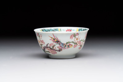 A set of six Chinese famille rose 'birds among flowering branches' cups and saucers, Yongzheng/Qianlong