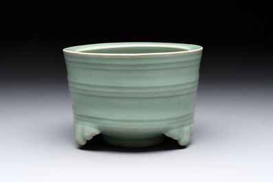 A Chinese Longquan celadon cylindrical tripod censer with trigrams design, Yuan/Ming