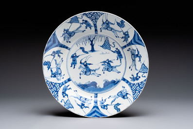 Three large Chinese blue and white 'hunting scene' deep dishes, Chenghua mark, Kangxi