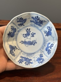 A set of six Chinese blue and white flower-shaped 'sanduo' cups and saucers, lingzhi mark, Kangxi