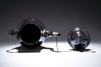 A black-glazed pottery coffeepot, teapot, milk jug and a bowl, Namur, 18th C.