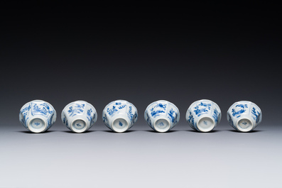 A set of six Chinese blue and white flower-shaped 'sanduo' cups and saucers, lingzhi mark, Kangxi