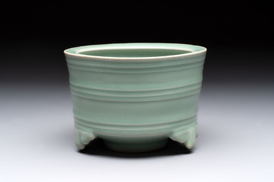 A Chinese Longquan celadon cylindrical tripod censer with trigrams design, Yuan/Ming