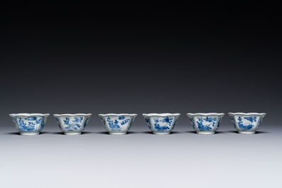 A set of six Chinese blue and white flower-shaped 'sanduo' cups and saucers, lingzhi mark, Kangxi