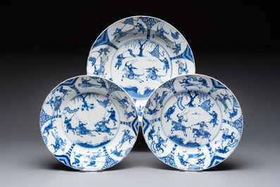 Three large Chinese blue and white 'hunting scene' deep dishes, Chenghua mark, Kangxi