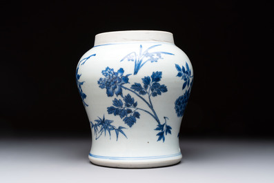 A Chinese blue and white vase with floral design, Transitional period