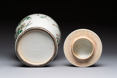 A Chinese famille verte 'phoenixes' vase and cover, 19th C.