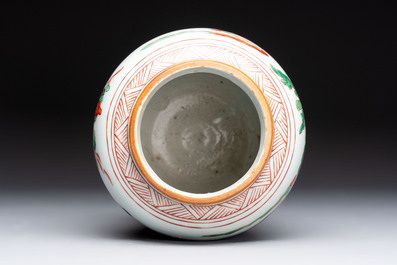 A small Chinese wucai jar with figures in a landscape, Transitional period