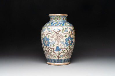 A Qajar polychrome pottery 'flower scroll' vase, Iran, 19th C.