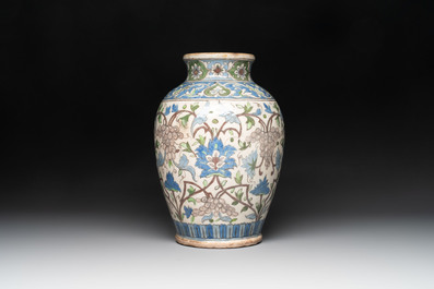 A Qajar polychrome pottery 'flower scroll' vase, Iran, 19th C.