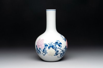 A Chinese blue, white and famille rose 'peonies' vase, Qianlong mark, 20th C.