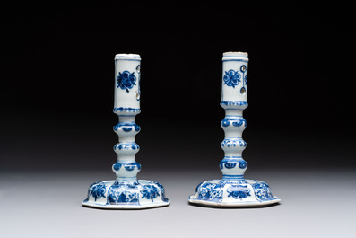 A pair of Chinese blue and white candlesticks with floral design, Kangxi