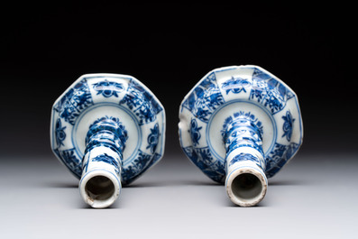 A pair of Chinese blue and white candlesticks with floral design, Kangxi