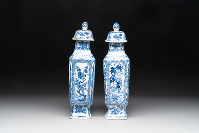 A pair of Chinese blue and white square vases and covers with floral design, Kangxi