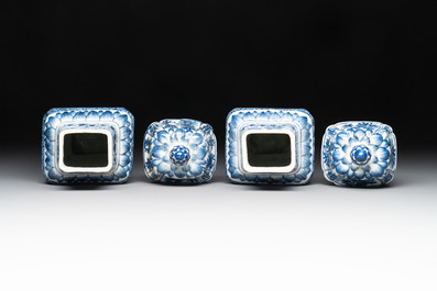 A pair of Chinese blue and white square vases and covers with floral design, Kangxi