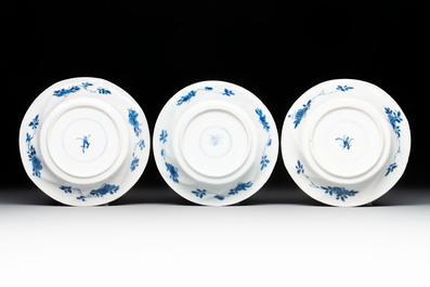 12 Chinese blue and white cups and 11 saucers with birds among flowering branches, Kangxi
