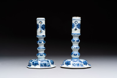 A pair of Chinese blue and white candlesticks with floral design, Kangxi
