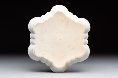 A Chinese famille rose semi-erotic 'milkmaid' pattipan or teapot stand, Qianlong, ca. 1740