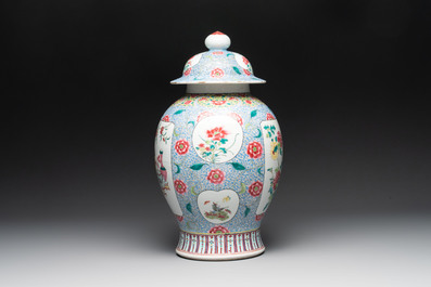 A Chinese famille rose 'rooster and antiquities' vase and cover, 19th C.