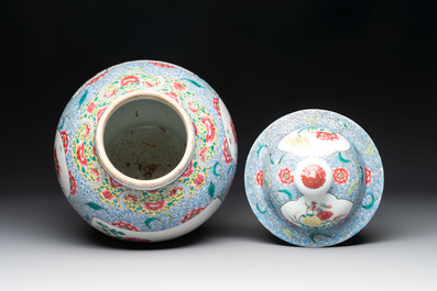 A Chinese famille rose 'rooster and antiquities' vase and cover, 19th C.