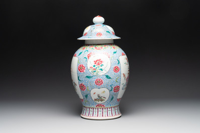 A Chinese famille rose 'rooster and antiquities' vase and cover, 19th C.