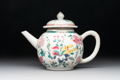A Chinese famille rose covered vase, teapot and a seated figure, and a famille noire pattipan or teapot stand, 18/19th C.