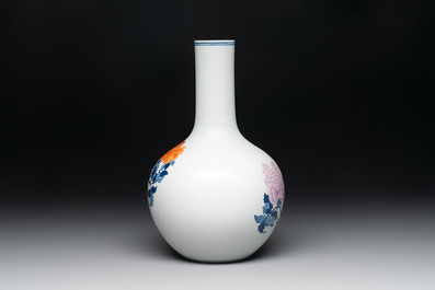 A Chinese blue, white and famille rose 'peonies' vase, Qianlong mark, 20th C.