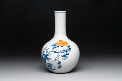 A Chinese blue, white and famille rose 'peonies' vase, Qianlong mark, 20th C.