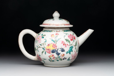 A Chinese famille rose covered vase, teapot and a seated figure, and a famille noire pattipan or teapot stand, 18/19th C.