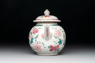 A Chinese famille rose covered vase, teapot and a seated figure, and a famille noire pattipan or teapot stand, 18/19th C.