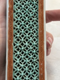 A Chinese iron-red and green-enamelled reticulated incense stick holder, 19th C.