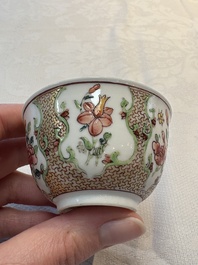 A fine Chinese gilt-decorated famille rose cup and saucer with floral design, Yongzheng