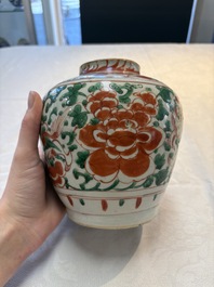A Chinese wucai jar and cover, a famille verte vase, a dish and three plates, Kangxi