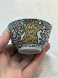 A fine Chinese gilt-decorated famille rose 'flower basket' cup and saucer, Yongzheng