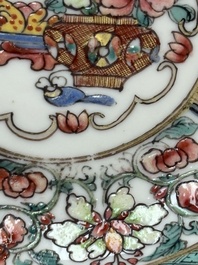 A fine Chinese gilt-decorated famille rose 'flower basket' cup and saucer, Yongzheng