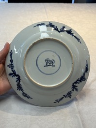 Seven Chinese blue and white plates with floral design, Kangxi